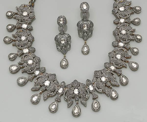 Appraisal: A set of diamond and silver-topped gold necklace with and