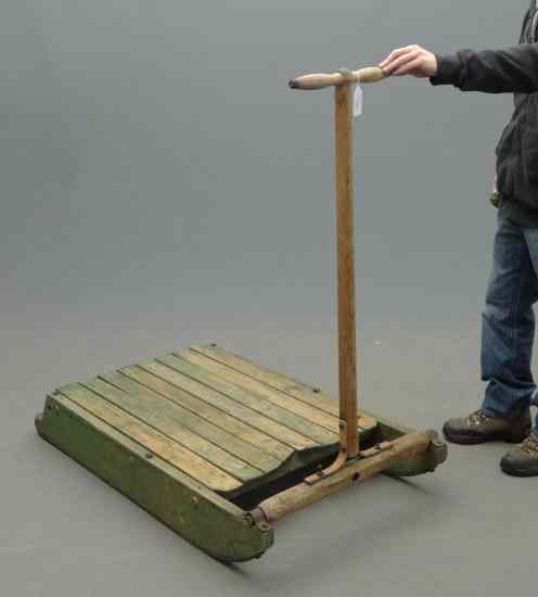 Appraisal: Primitive painted pull sled Provenance Myron Goldfinger Collection