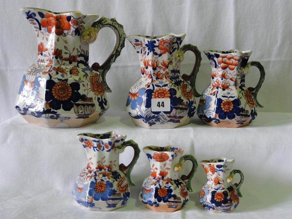 Appraisal: A graduated set of six th century Masons Ironstone jugs