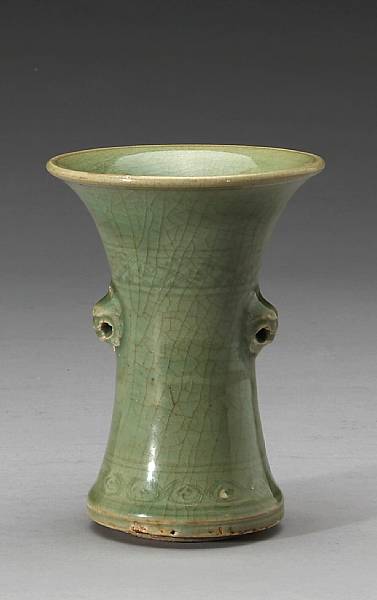 Appraisal: A Longquan celadon trumpet mouth vase Late Ming Dynasty Thickly