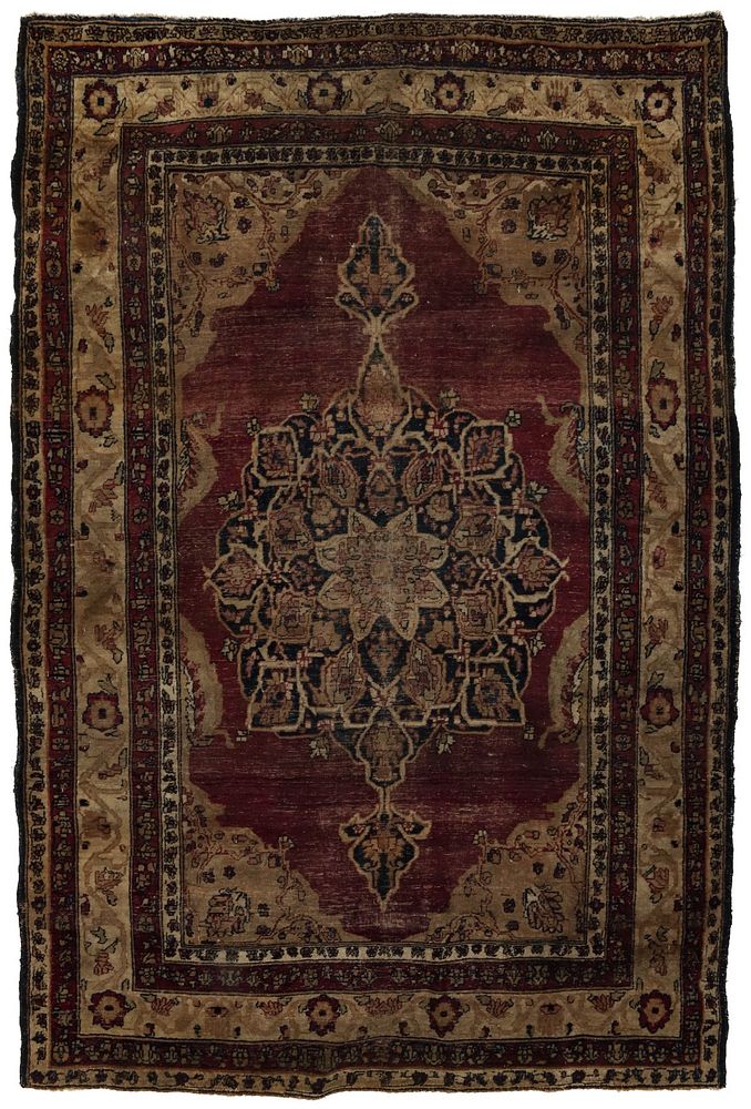 Appraisal: AN ANTIQUE KIRMAN HAND MADE PERSIAN RUG The elaborate medallion