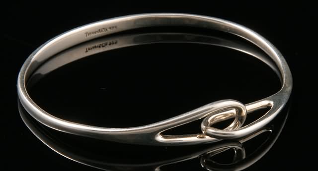 Appraisal: Sterling silver bangle X mm inner diameter gms Ship plus