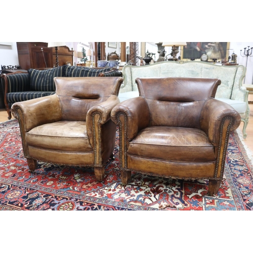 Appraisal: Pair of modern leather tub armchairs brass studded trim