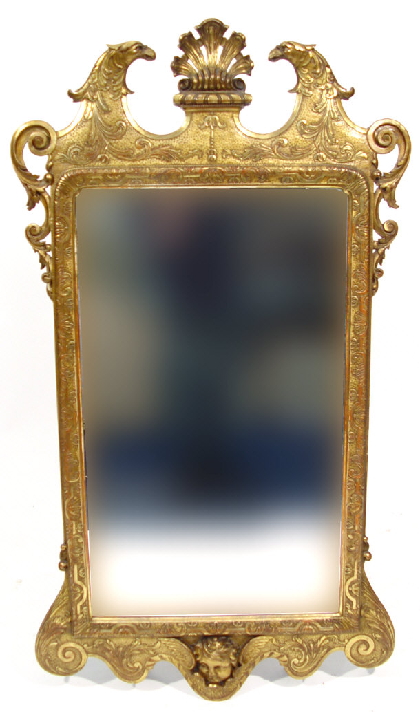 Appraisal: Gilt framed mirror with eagle design broken pediment and cherub