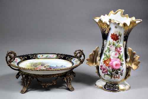 Appraisal: A French porcelain and gilt metal mounted oval two-handled comport