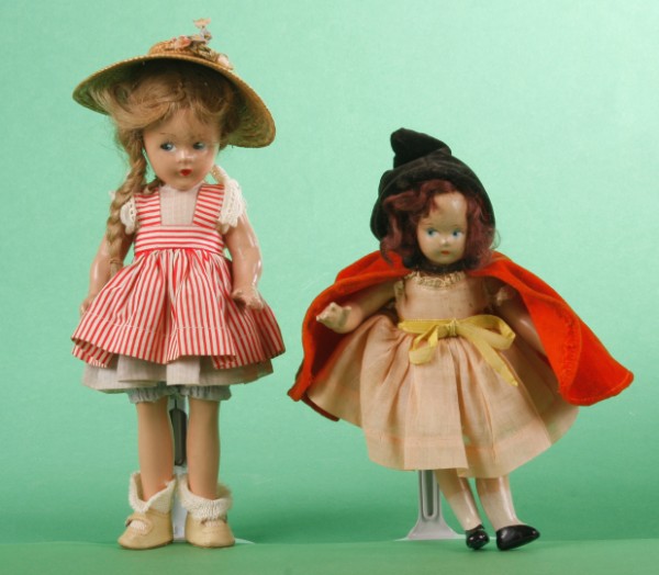 Appraisal: Pair of Madame Alexander tagged composition Birthday Doll -October Tiny