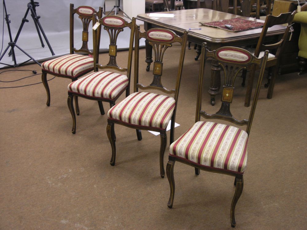 Appraisal: A set of four Edwardian mahogany salon single chairs with