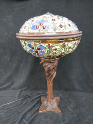 Appraisal: Leaded Glass Lamp jeweled floral bronzed swirling base diameter tall