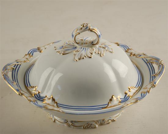 Appraisal: A Porcelain Covered Dish loop handle atop dome cover conforming