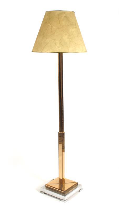 Appraisal: A peach tinted glass mounted wooden floor lamp