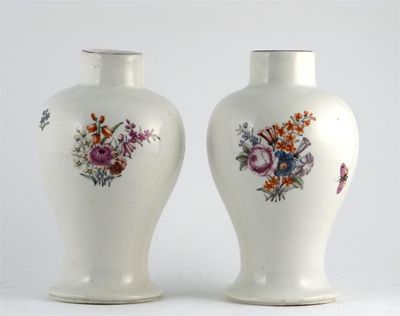 Appraisal: A pair of Chelsea baluster vases delicately painted with floral