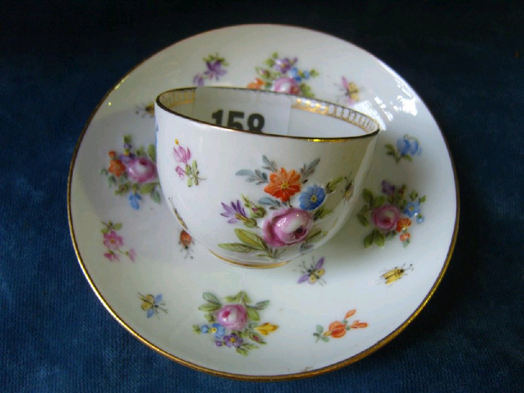 Appraisal: An early th century Meissen miniature tea bowl and saucer