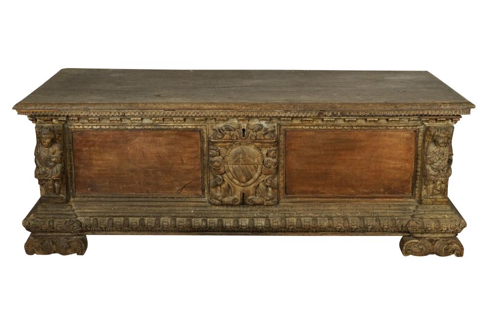 Appraisal: CARVED WALNUT CASSONEwith hinged lid concealing an open interior Condition