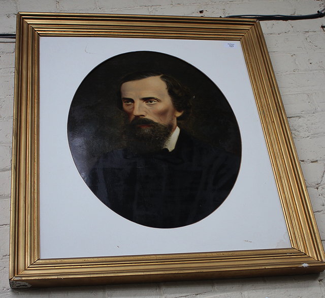 Appraisal: A VICTORIAN OVERPAINTED PHOTOGRAPHIC PORTRAIT of a bearded gentleman in