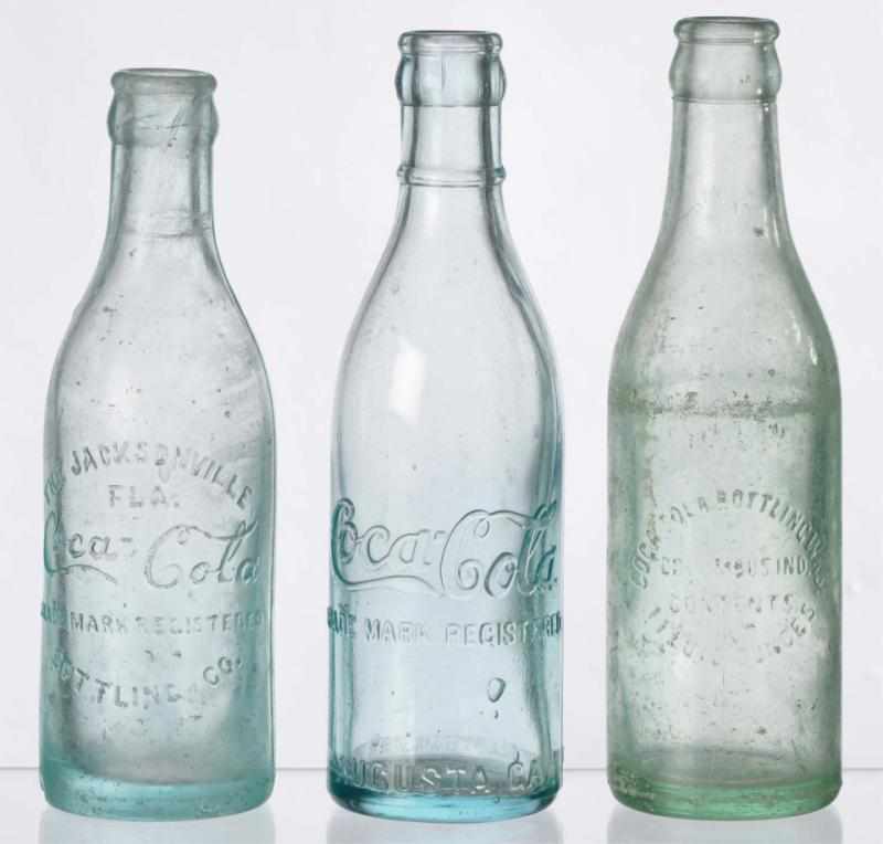 Appraisal: Lot of Coca-Cola Straight Sided Bottles Description Includes Augusta GA