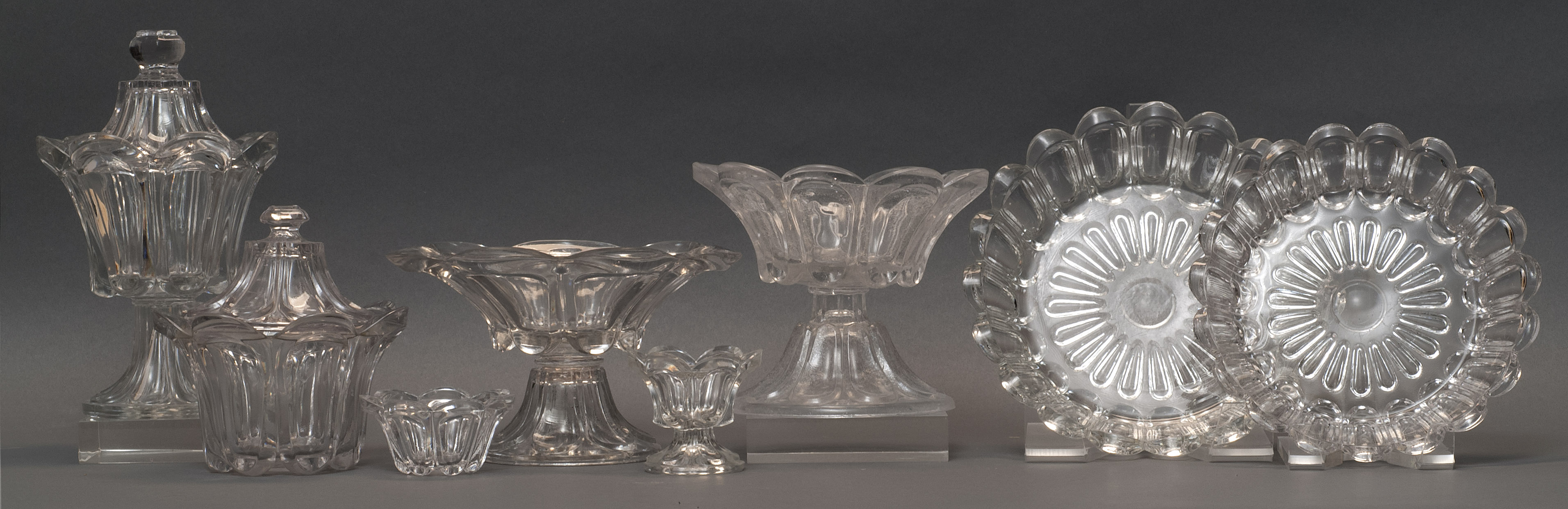 Appraisal: EIGHT SANDWICH GLASS COMPANY CLEAR FLINT PATTERN GLASS ITEMS Third