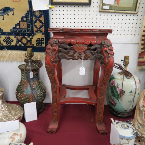 Appraisal: Chinese Lacquerware Stand carved dragon on top tall