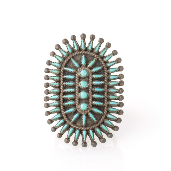 Appraisal: AN IMPRESSIVE ZUNI PETIT POINT RING WITH STONESThe size ring