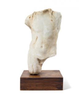 Appraisal: A Roman Marble Torso of a Deity Height of torso