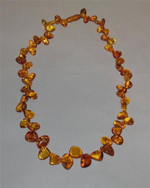 Appraisal: AMBER GRADUATED BEAD NECKLACE in long