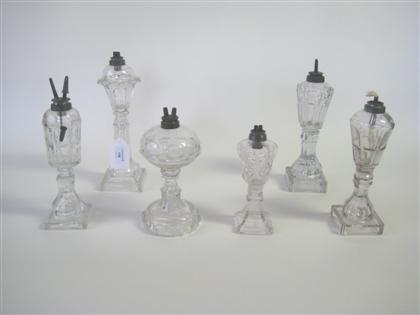 Appraisal: Six uncolored and pressed glass fluid lamps new england th