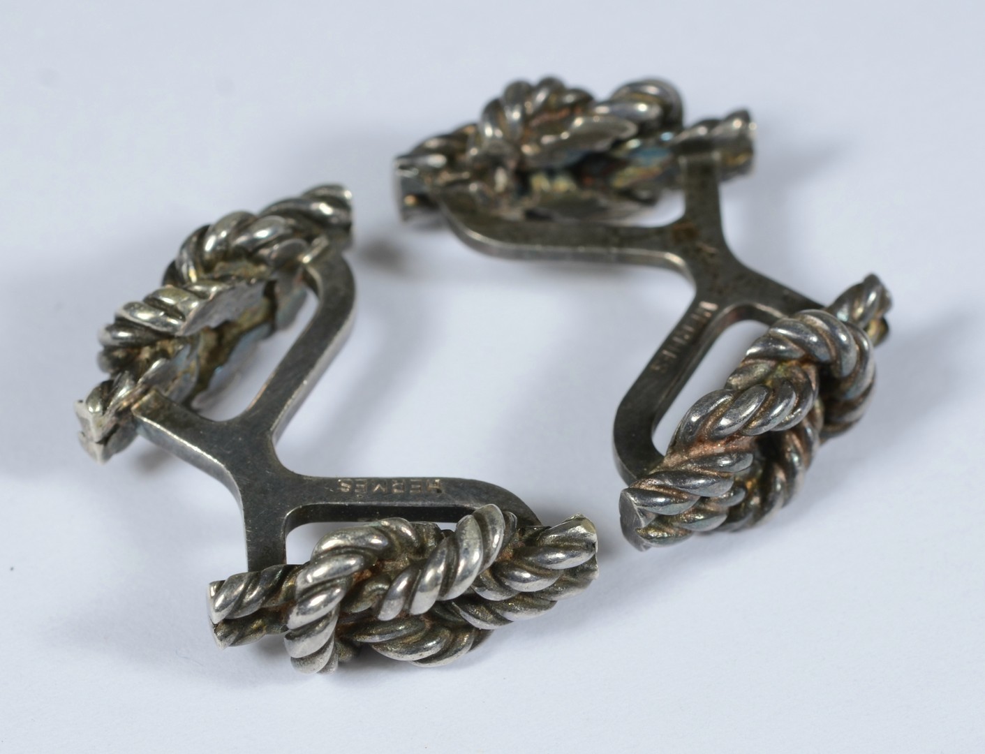 Appraisal: Hermes silver cufflinks twisted knot design x French hallmarks