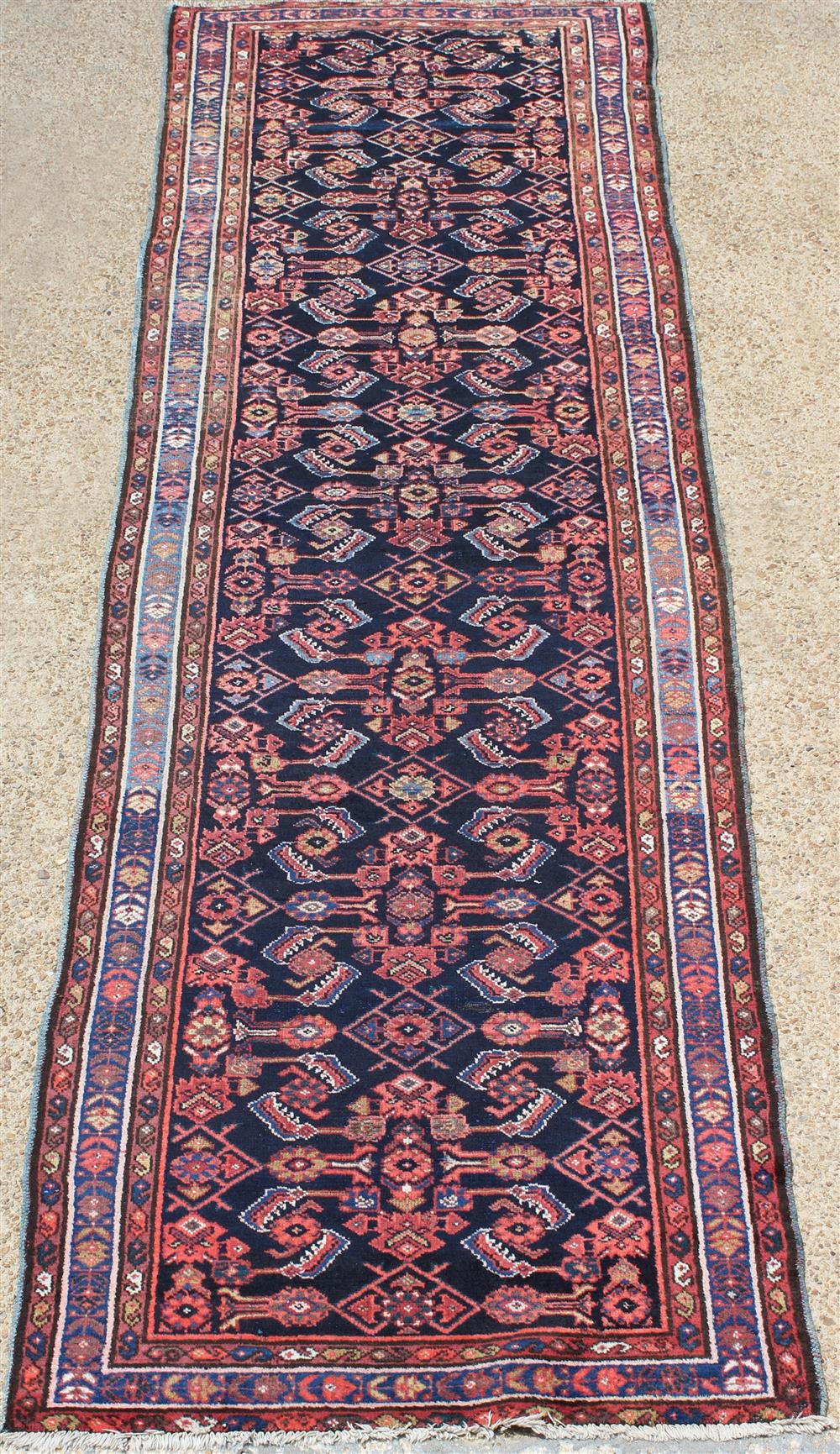 Appraisal: ANTIQUE PERSIAN MALAYER WOOL RUNNER all over central design on