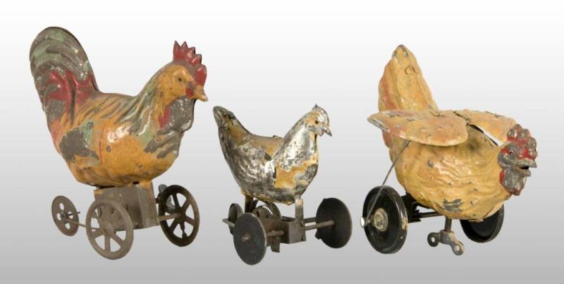 Appraisal: Lot of Tin Hand-Painted Rooster Toys Description German Includes one