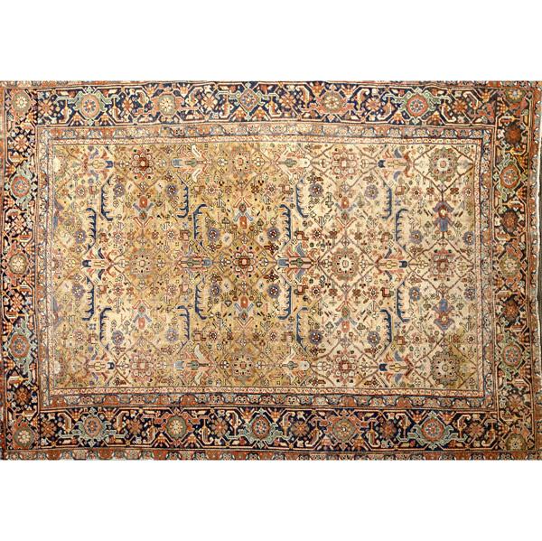 Appraisal: HERIZ Oriental carpet with floral medallion decoration on cream ground