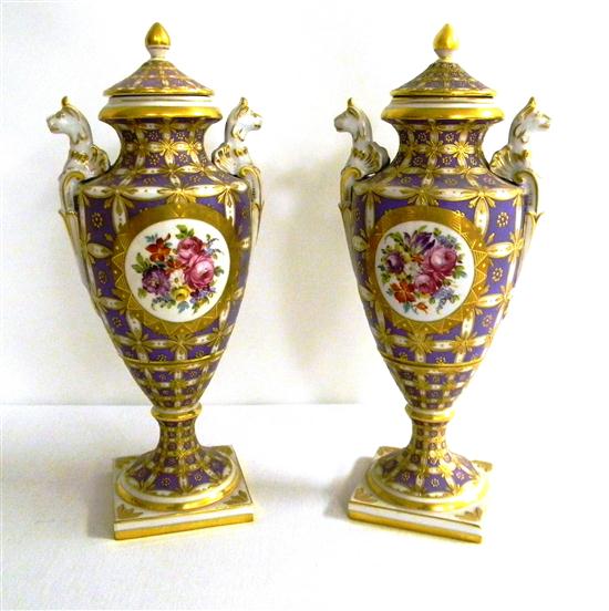 Appraisal: Pair Sevres type covered urns gilt and lavender decoration ''Mre