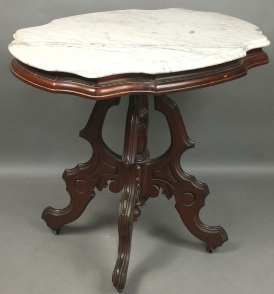 Appraisal: th Century Victorian walnut marble-top table with serpentine sides h