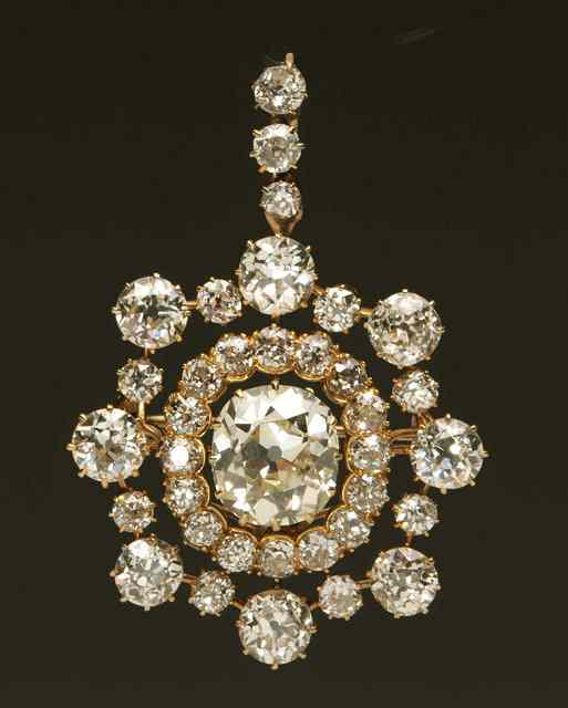 Appraisal: A DIAMOND SET PENDANT CUM BROOCH set with a central