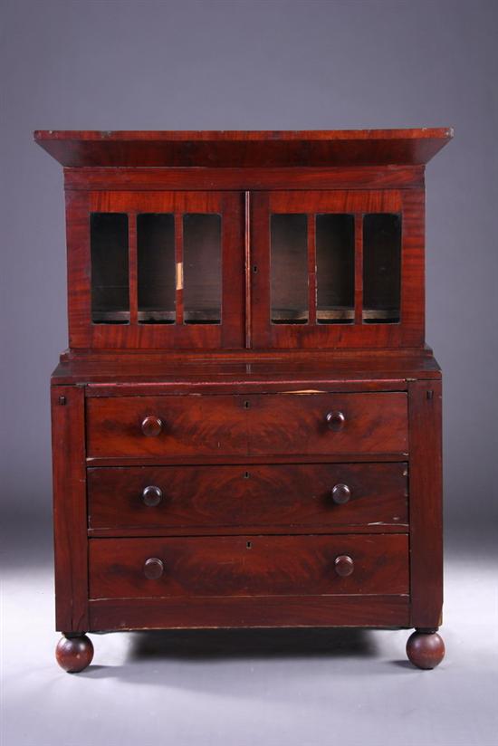 Appraisal: AMERICAN EMPIRE MAHOGANY SECRETARY BOOKCASE th century In two parts