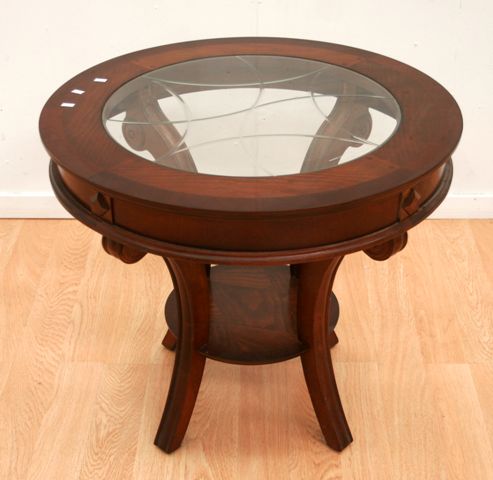 Appraisal: A mid th century mahogany and glass occasional table