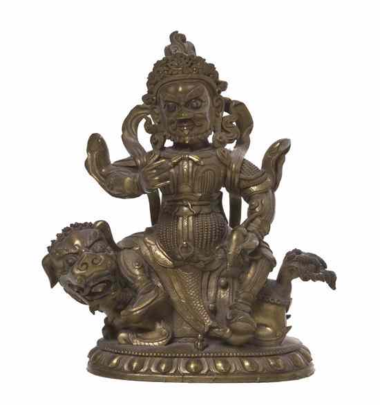 Appraisal: A Chinese Gilt Bronze Figure of a Deity in the