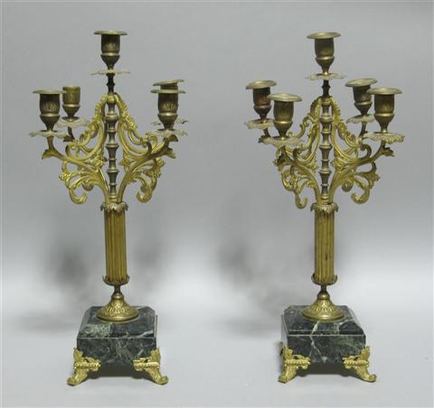 Appraisal: PAIR OF REGENCE STYLE GILT FIVE-LIGHT CANDELABRA The five scrolling