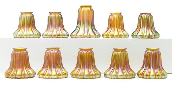 Appraisal: A Set of nine Steuben Aurene ribbed glass shades shape