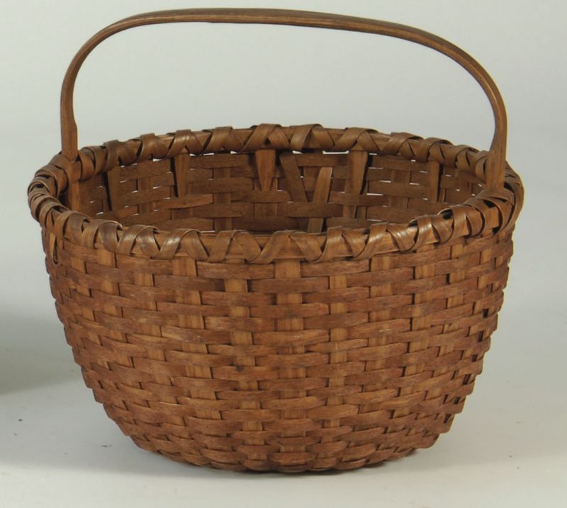 Appraisal: EARLY LARGE SPLINTWORK HANDLED BASKET Diameter Overall height