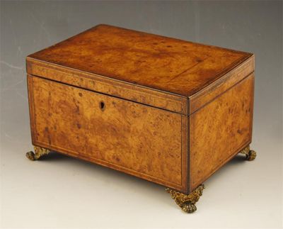 Appraisal: An early th century pollarded oak tea caddy with tulipwood