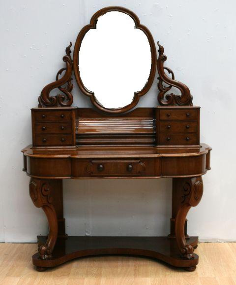 Appraisal: A Victorian walnut veneered dressing table cm wide cm deep