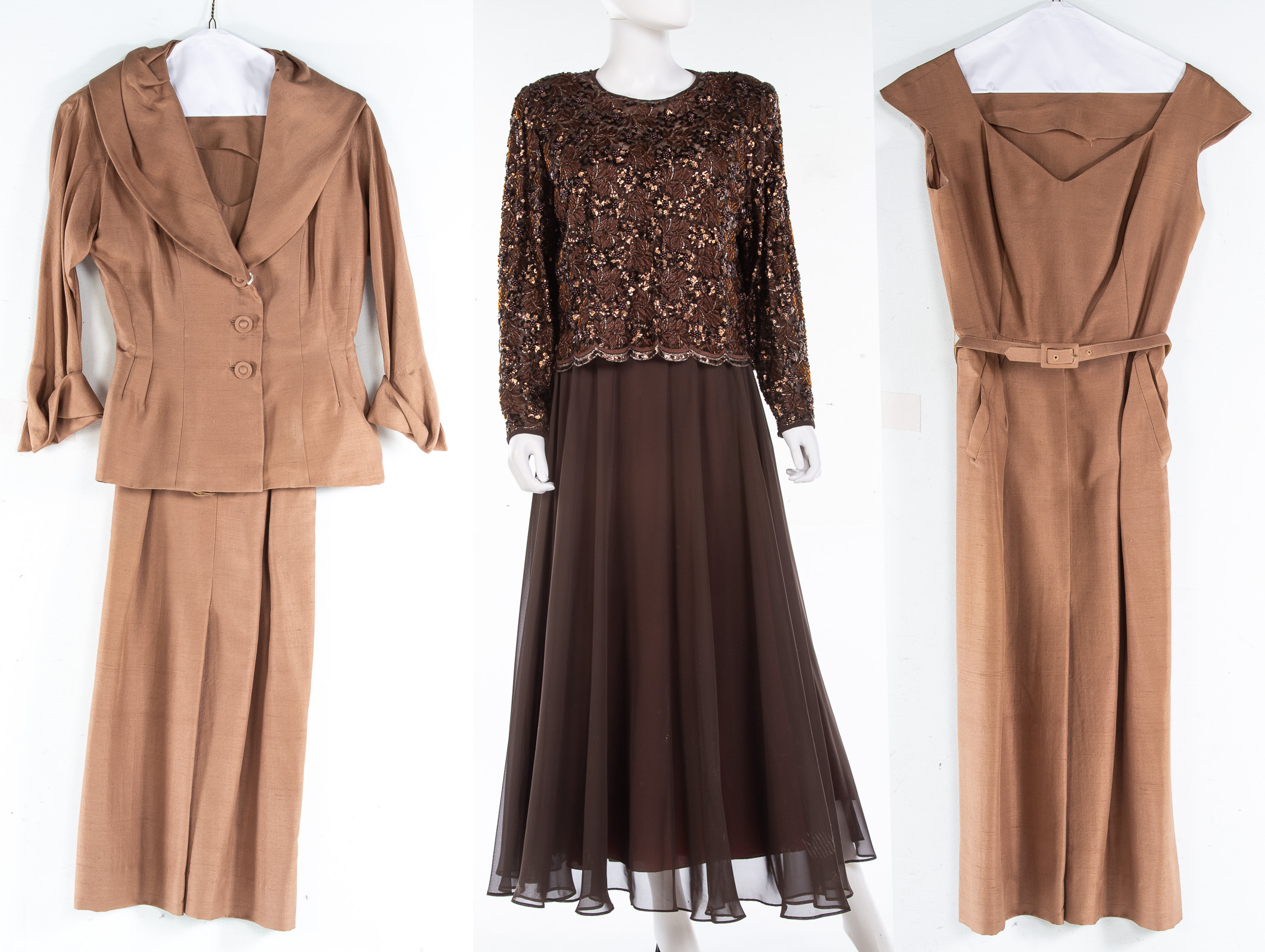 Appraisal: TWO BROWN DRESSES Heavily beaded dress is size Dress with