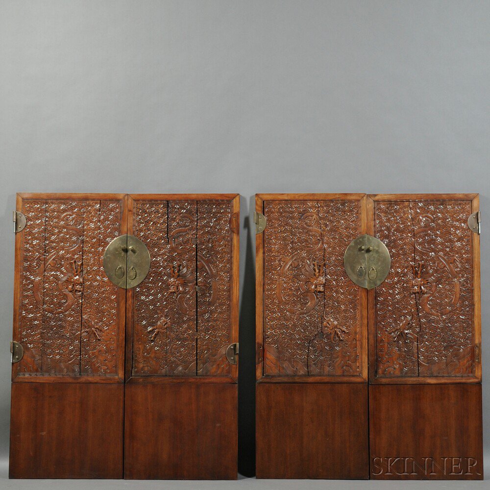 Appraisal: Four Carved Doors China th century hardwood depicting dragons cavorting