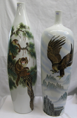 Appraisal: TWO KYOTA-WARE VASES bottle form One decorated with a soaring