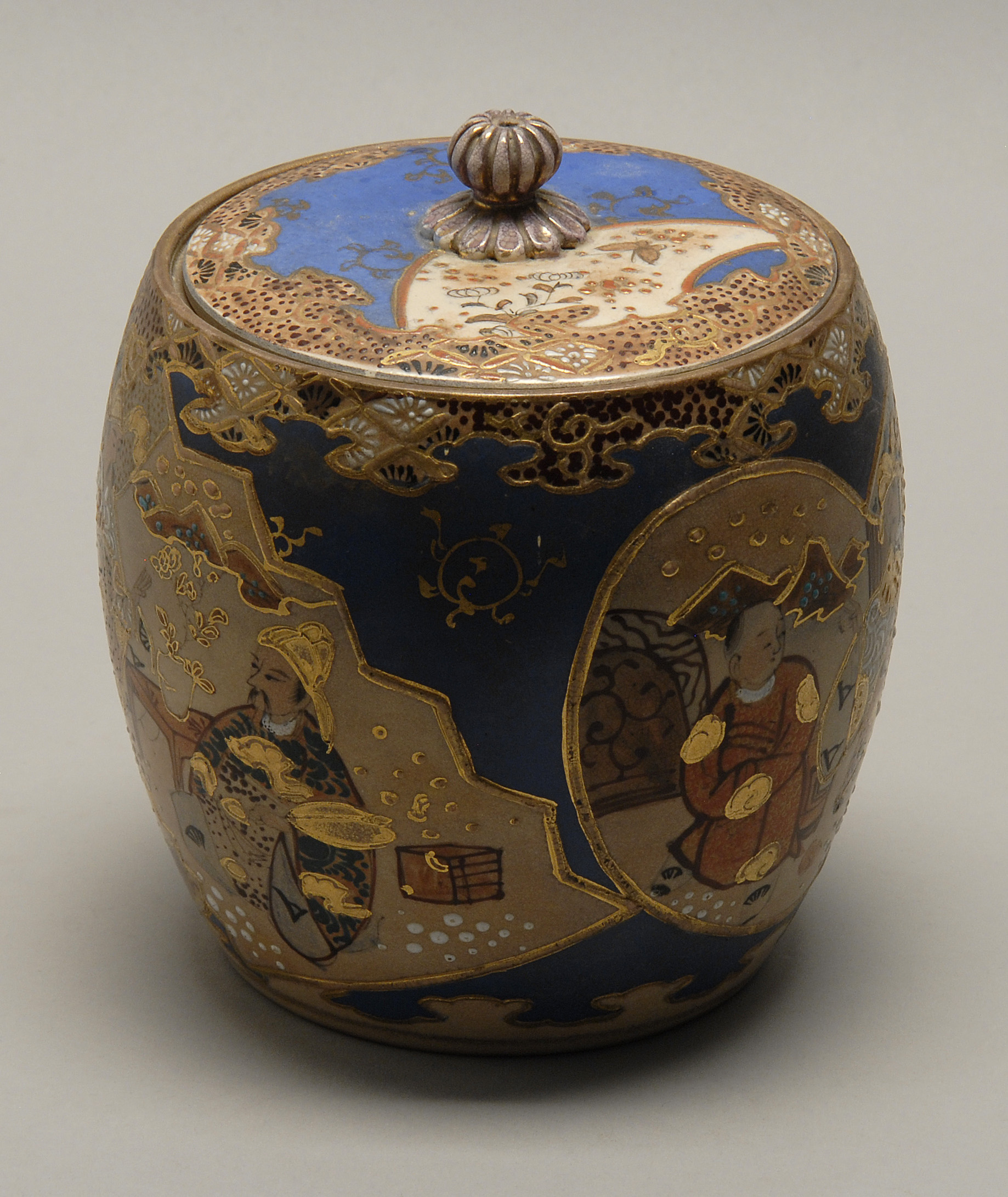 Appraisal: SATSUMA POTTERY JAR Meiji PeriodIn drum form with figural design