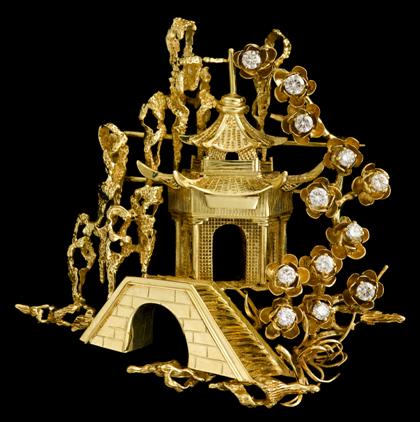 Appraisal: karat yellow gold and diamond 'pagoda' broochDisplaying a bridge and