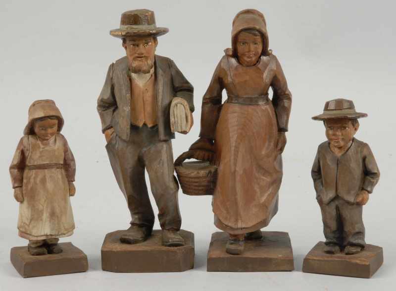 Appraisal: Lot of Carved Wooden Amish Figures Description Possibly German Includes