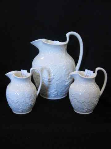 Appraisal: Wedgwood Embossed Queensware Pitchers pair of '' milk pitchers and