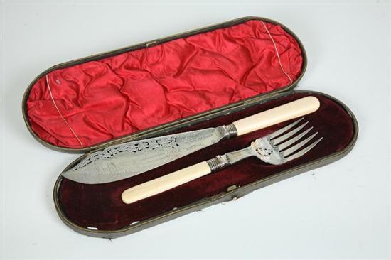 Appraisal: TWO PIECE FISH SET Silverplated pierced knife and fork with