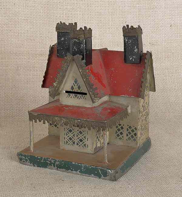 Appraisal: George Brown painted tin gingerbread cottage bank h