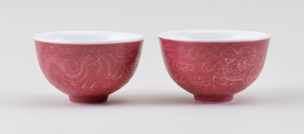 Appraisal: PAIR OF ROUGE RED PORCELAIN WINE CUPS EARLY TH CENTURY